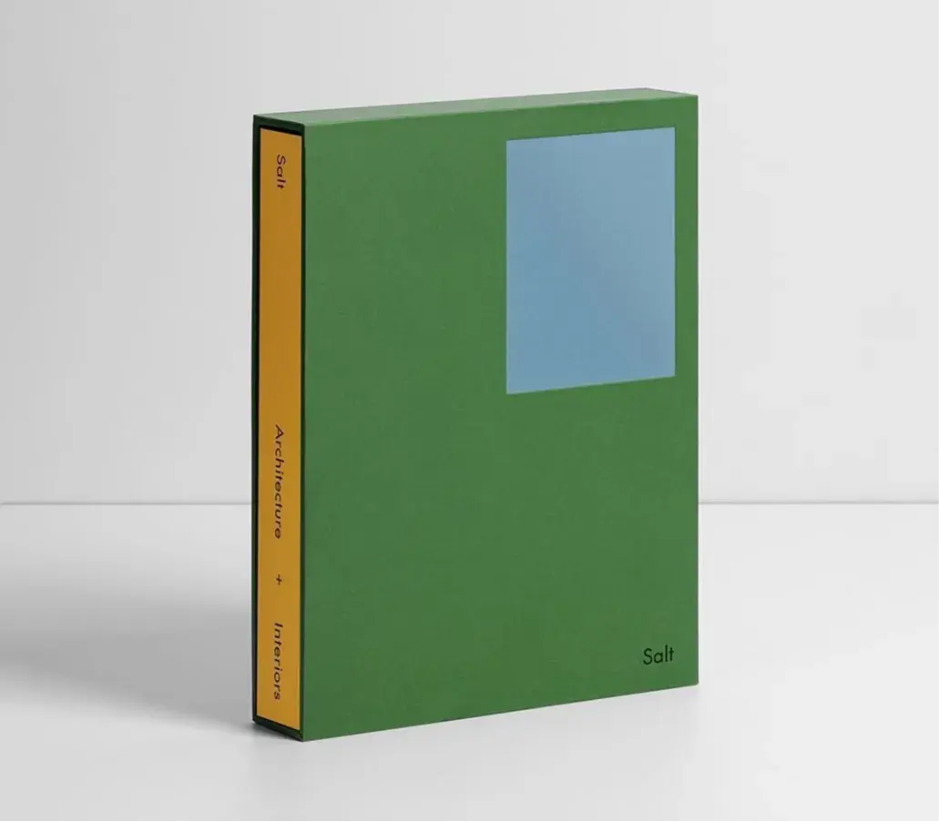 Green book with a blue square cover and yellow spine, titled "Salt: Architecture + Interiors".