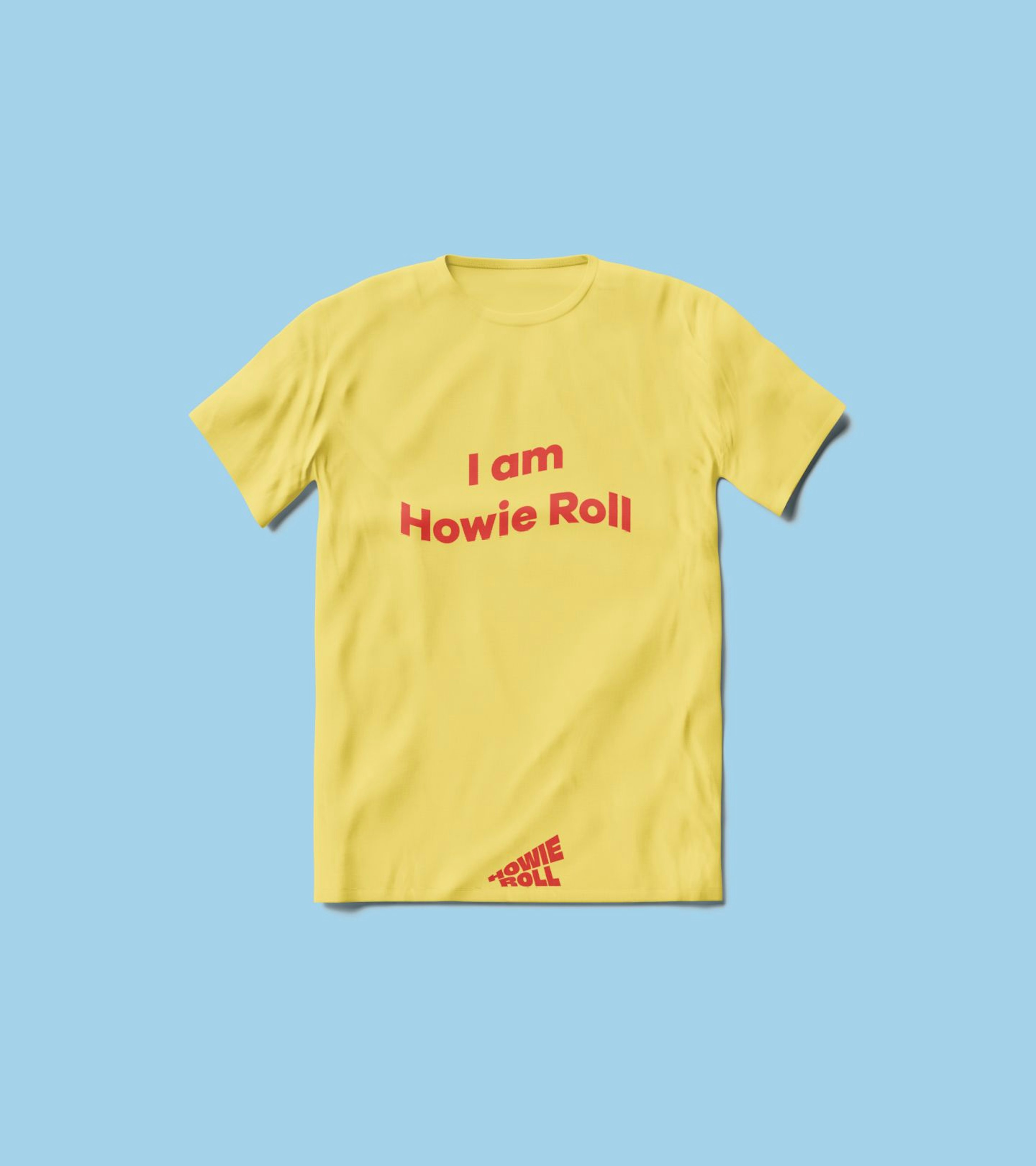 A yellow t-shirt reading 'I am Howie Roll' on a light blue background