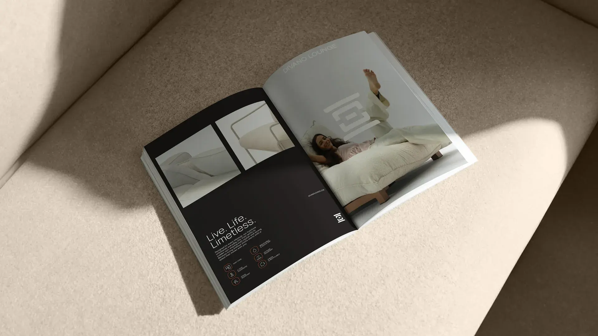 Open brochure on a beige sofa featuring minimalist furniture images and the text “Live Life Limitless” on a dark page.