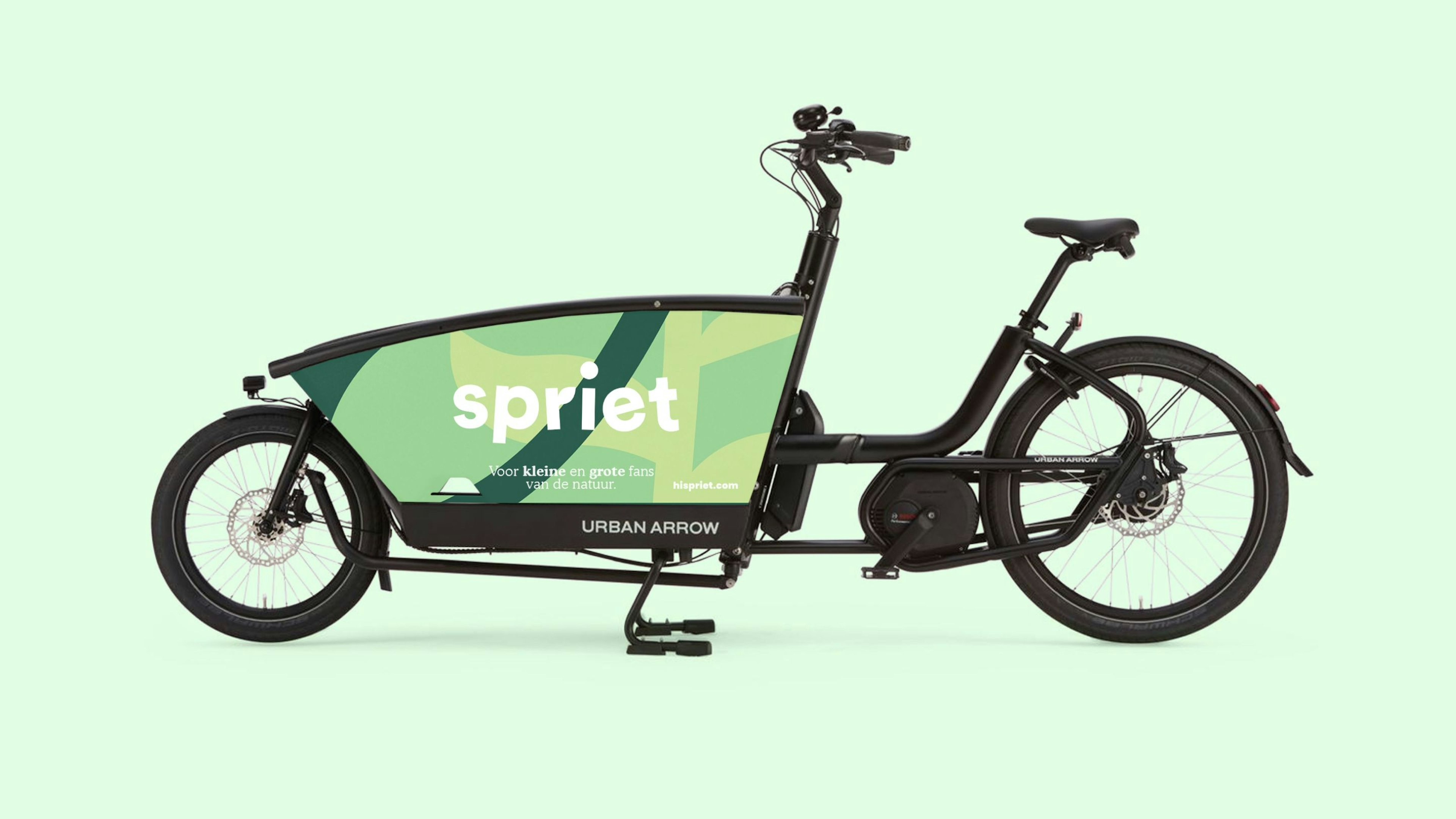 An Urban Arrow bike with the Spriet branding on it.