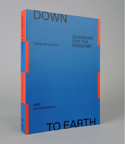 Blue book titled "Down to Earth: Designing for the Endgame" by George Brugmans, with orange accents. Published by nai010 publishers.
