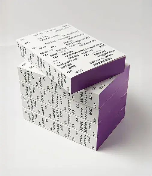 Stacked books with white covers featuring repeated text, "on sense and sens," and purple spines, displayed against a white background.